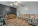 Relaxing living room with two sofas and wood-look flooring at 919 Patrick St, Kissimmee, FL 34741