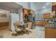 Kitchen with wood cabinets, stainless steel appliances, and granite countertops at 919 Patrick St, Kissimmee, FL 34741