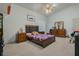 Spacious bedroom with a double bed and dresser at 919 Patrick St, Kissimmee, FL 34741