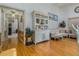 Bright hallway with hardwood floors and access to other rooms at 919 Patrick St, Kissimmee, FL 34741