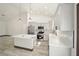 Modern kitchen with white cabinets, a large island, and pendant lighting at 3610 Se 131St Ln, Belleview, FL 34420