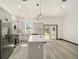 Modern kitchen with stainless steel appliances and island at 3610 Se 131St Ln, Belleview, FL 34420