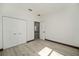 Bedroom with double door closet and access to bathroom at 3610 Se 131St Ln, Belleview, FL 34420