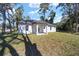 Single story home with covered patio and grassy backyard at 3610 Se 131St Ln, Belleview, FL 34420