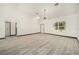 Spacious living area with vinyl flooring and natural light at 3610 Se 131St Ln, Belleview, FL 34420