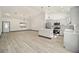 Open concept kitchen with island and new appliances at 3610 Se 131St Ln, Belleview, FL 34420