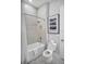 Bathroom with shower/tub combo and neutral tile at 7740 Sandy Ridge Dr # 106, Reunion, FL 34747
