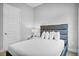 Cozy bedroom with a full-size bed and neutral decor at 7740 Sandy Ridge Dr # 106, Reunion, FL 34747
