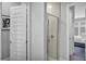 Clean bathroom with a shower and white tile at 7740 Sandy Ridge Dr # 106, Reunion, FL 34747
