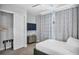 Cozy bedroom featuring a twin bed, TV, and ample closet space at 7740 Sandy Ridge Dr # 106, Reunion, FL 34747