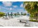 Relaxing community pool with lounge chairs and a ping pong table at 7740 Sandy Ridge Dr # 106, Reunion, FL 34747