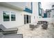 Private patio with lounge seating and dining furniture at 7740 Sandy Ridge Dr # 106, Reunion, FL 34747