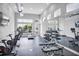 Well-equipped fitness center with treadmills, ellipticals and weight machines at 7740 Sandy Ridge Dr # 106, Reunion, FL 34747