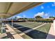 Outdoor shuffleboard courts with covered seating at 815 Forest Breeze Path, Leesburg, FL 34748