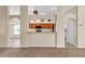Kitchen with a breakfast bar and access to other rooms at 815 Forest Breeze Path, Leesburg, FL 34748