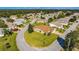 Aerial view of a single-Gathering home in a residential community at 815 Forest Breeze Path, Leesburg, FL 34748