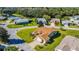 Aerial view of a house situated on a quiet cul-de-sac at 815 Forest Breeze Path, Leesburg, FL 34748