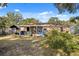 Screened patio with outdoor furniture at 540 Park Glen Dr, Tavares, FL 32778