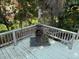 Relaxing outdoor deck with fire pit, perfect for entertaining at 2494 County Road 447, Lake Panasoffkee, FL 33538