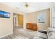 Cozy living room with a comfortable couch and built-in shelving at 2411 Greenlaw Ct, Leesburg, FL 34788