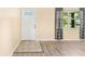 Bright entryway with tile flooring and a neutral color scheme at 2411 Greenlaw Ct, Leesburg, FL 34788