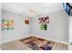 Bright bedroom with ceiling fan and new flooring at 2411 Greenlaw Ct, Leesburg, FL 34788