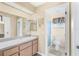 Clean bathroom with updated vanity and shower at 2411 Greenlaw Ct, Leesburg, FL 34788