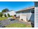 Private backyard with patio and landscaping at 2411 Greenlaw Ct, Leesburg, FL 34788