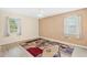 Spacious bedroom with neutral walls and new flooring at 2411 Greenlaw Ct, Leesburg, FL 34788