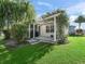 Backyard with pergola, landscaping, and patio at 3358 Quail Hollow Ct, The Villages, FL 32163