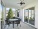 Screened patio with table and chairs, great for relaxing at 3358 Quail Hollow Ct, The Villages, FL 32163