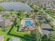 Resort-style community pool with ample deck space at 3358 Quail Hollow Ct, The Villages, FL 32163
