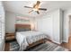 Bright bedroom with double bed, nightstand and large closet at 3358 Quail Hollow Ct, The Villages, FL 32163