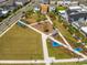 Aerial view of community with playground, park, and homes at 10156 Ballast Dr, Orlando, FL 32827