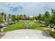 Community park with butterfly art and green space at 10156 Ballast Dr, Orlando, FL 32827