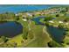 Golf course community with lakefront properties at 17601 Sawgrass Run, Tavares, FL 32778