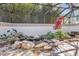 Peaceful indoor garden with a small pond and various plants at 17601 Sawgrass Run, Tavares, FL 32778