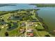 Aerial view of luxury homes and golf course at 17601 Sawgrass Run, Tavares, FL 32778