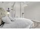 Serene bedroom with light wood floors and ceiling fan at 17601 Sawgrass Run, Tavares, FL 32778