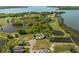 Property location shown with respect to the golf course and lake at 17601 Sawgrass Run, Tavares, FL 32778