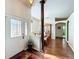 Bright dining room with hardwood floors and a large wood hutch at 25611 Maurepas Ln, Leesburg, FL 34748