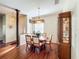 Spacious dining area with hardwood floors and natural light at 25611 Maurepas Ln, Leesburg, FL 34748