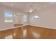 Bright bedroom with hardwood floors and large windows at 305 Shadow Harbour Ln # 305, Mount Dora, FL 32757