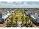 Aerial view of community with green space and homes at 9934 Fiddley Aly, Orlando, FL 32827