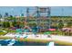 Aerial view of a challenging rope course next to a lake at 9934 Fiddley Aly, Orlando, FL 32827