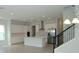 Modern kitchen with white cabinets, stainless steel appliances, and an island at 9934 Fiddley Aly, Orlando, FL 32827