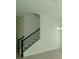 Modern black metal railing staircase at 9934 Fiddley Aly, Orlando, FL 32827