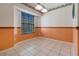 Small dining area with tile floors and a window with mini blinds at 24814 Riverboat Bnd, Leesburg, FL 34748