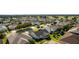 Community overview, showcasing numerous homes and green spaces at 1312 Landeros Ln, The Villages, FL 32159