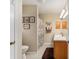 Clean bathroom with shower/tub combo and wood vanity at 1312 Landeros Ln, The Villages, FL 32159